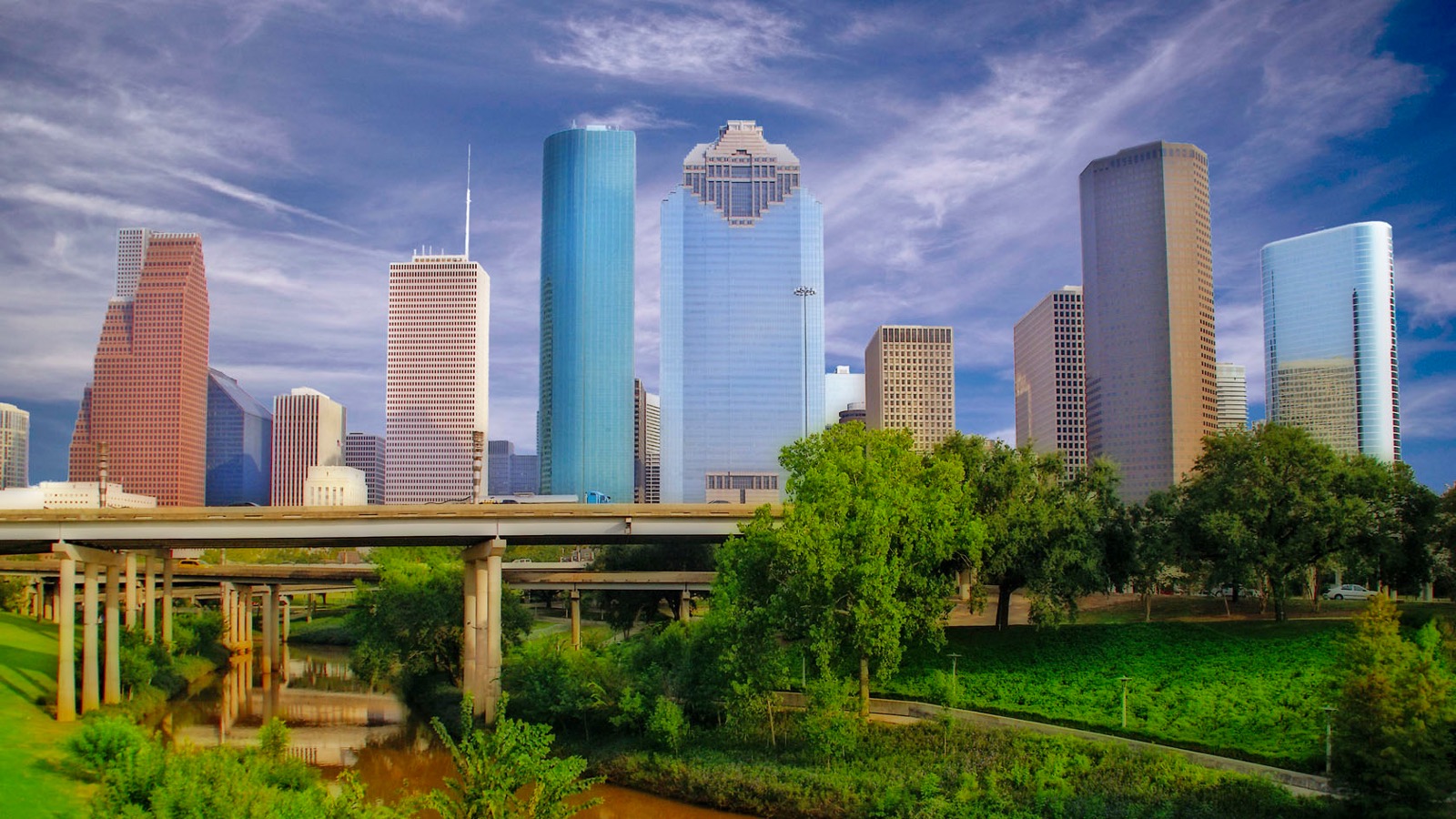 The Houston skyline behind Buffalo Bayou Park.