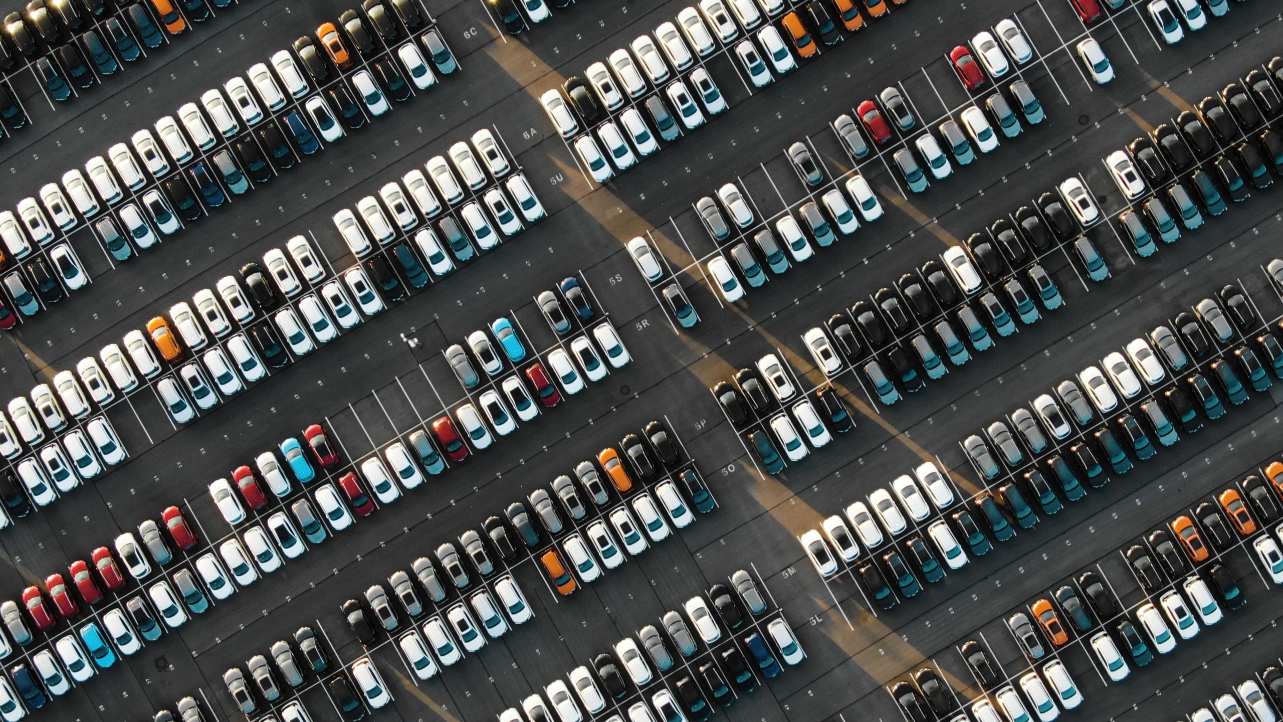 aerial view of cars in a parking lot