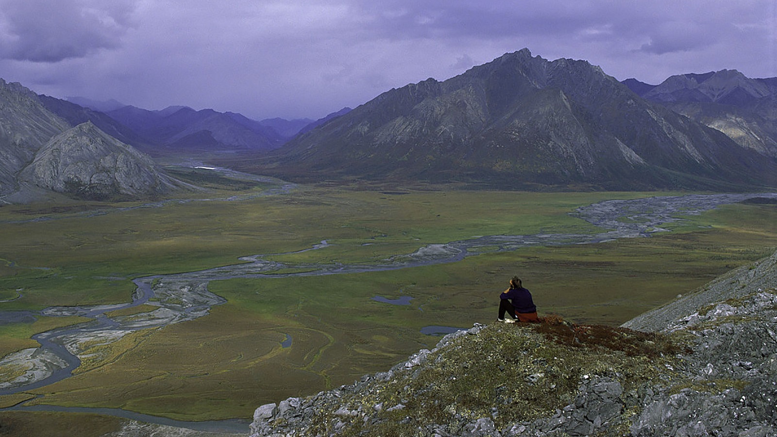 Hiker overlooking the Arctic National Wildlife Refuge