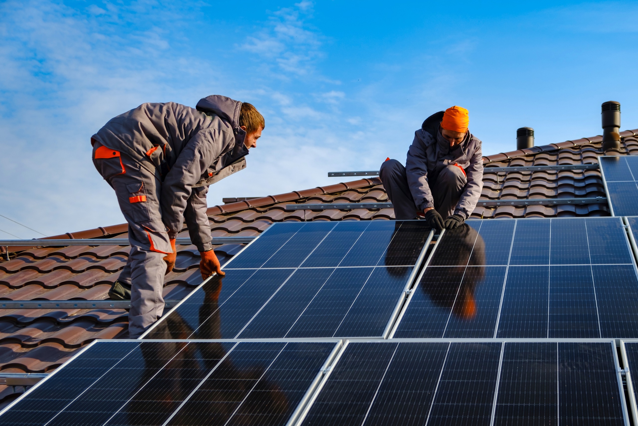 solar-panel-installation-2070531521-AlyoshinE-via-Shutterstock