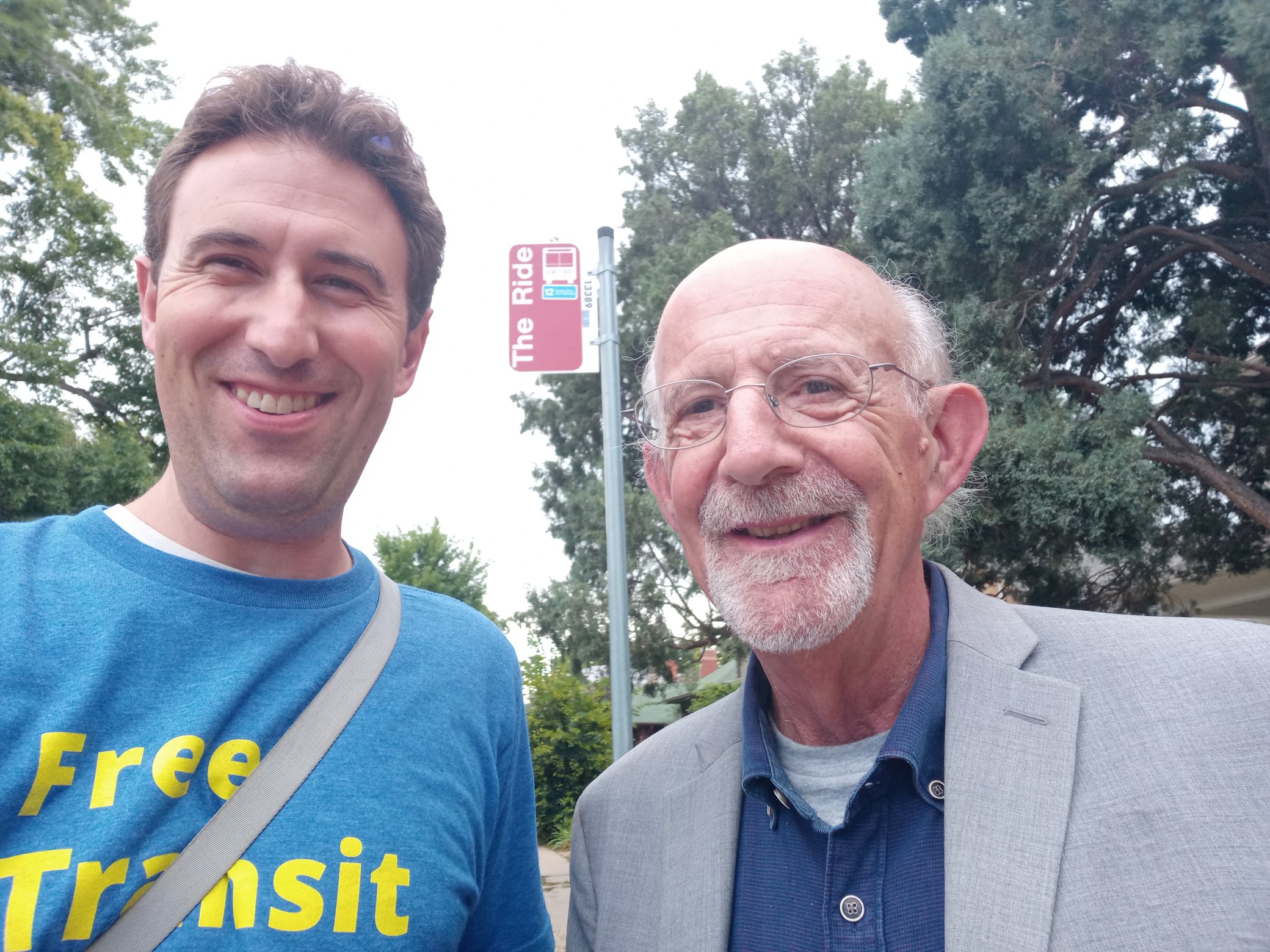 Danny Katz with Denver City Councilman Paul Kashmann at Regional Transportation District bus stop.