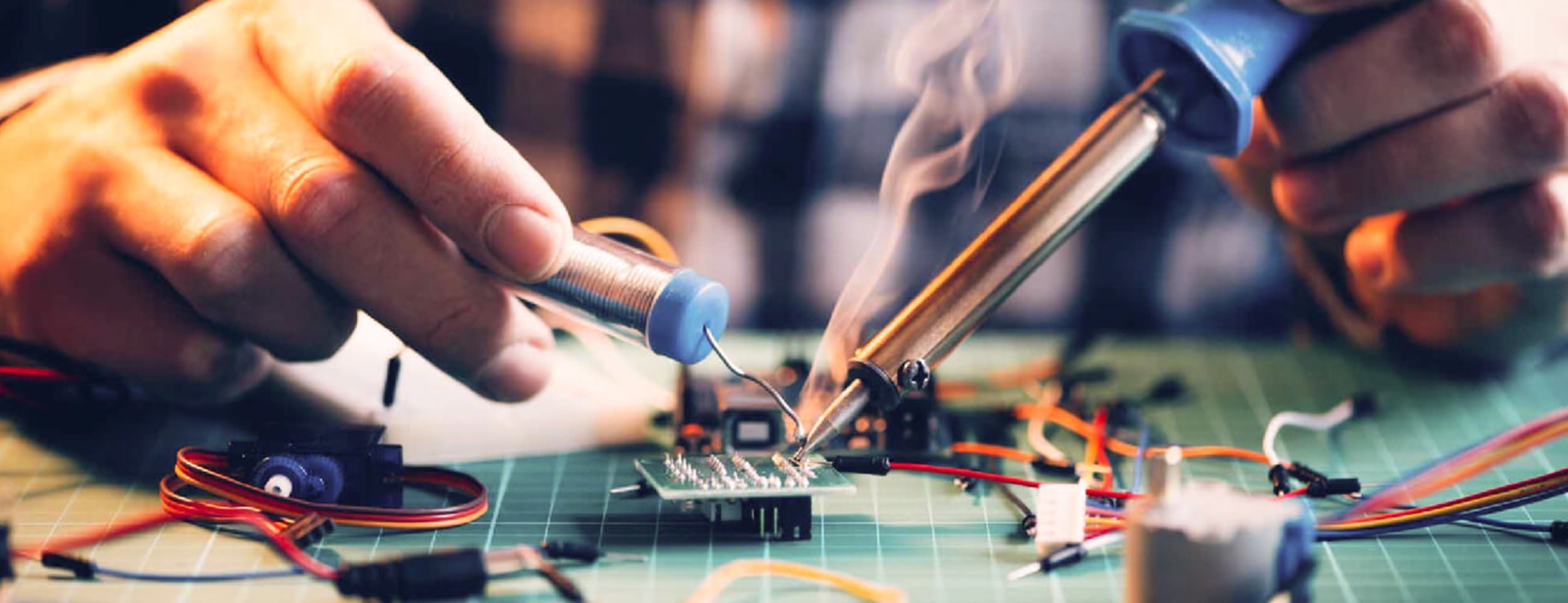 A person fixing a laptop computer